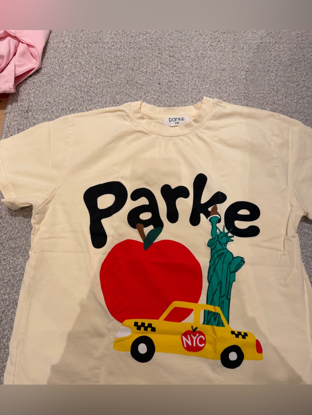 Parke Cream Graphic Short Sleeve Tee - NYC Apple Taxi Design